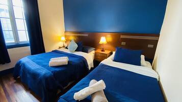 Family Room | 1 bedroom, minibar, free WiFi, bed sheets