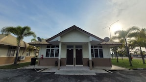 A two-story building with a flat roof, large windows, and a central entrance. - PendangLakeResort (Bukit Raya)