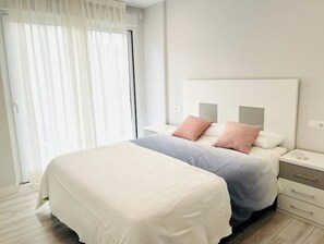 2 dormitorios, escritorio, tabla de planchar con plancha y wifi gratis