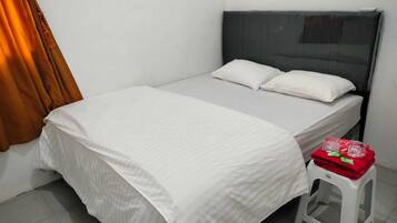 Basic Villa | Laptop workspace, bed sheets