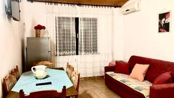 Apartment, 2 Bedrooms, Smoking, Balcony | Living area