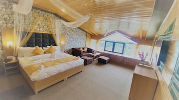 Royal Suite, 1 King Bed with Sofa bed, Lake View, Lakeside | Living area | 43-inch Smart TV with cable channels, TV, table football