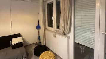 Design Apartment, 1 Bedroom, Balcony, Courtyard View | Living area | 100-cm TV with satellite channels