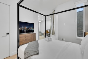 Design Condo | Premium bedding, down comforters, desk, laptop workspace