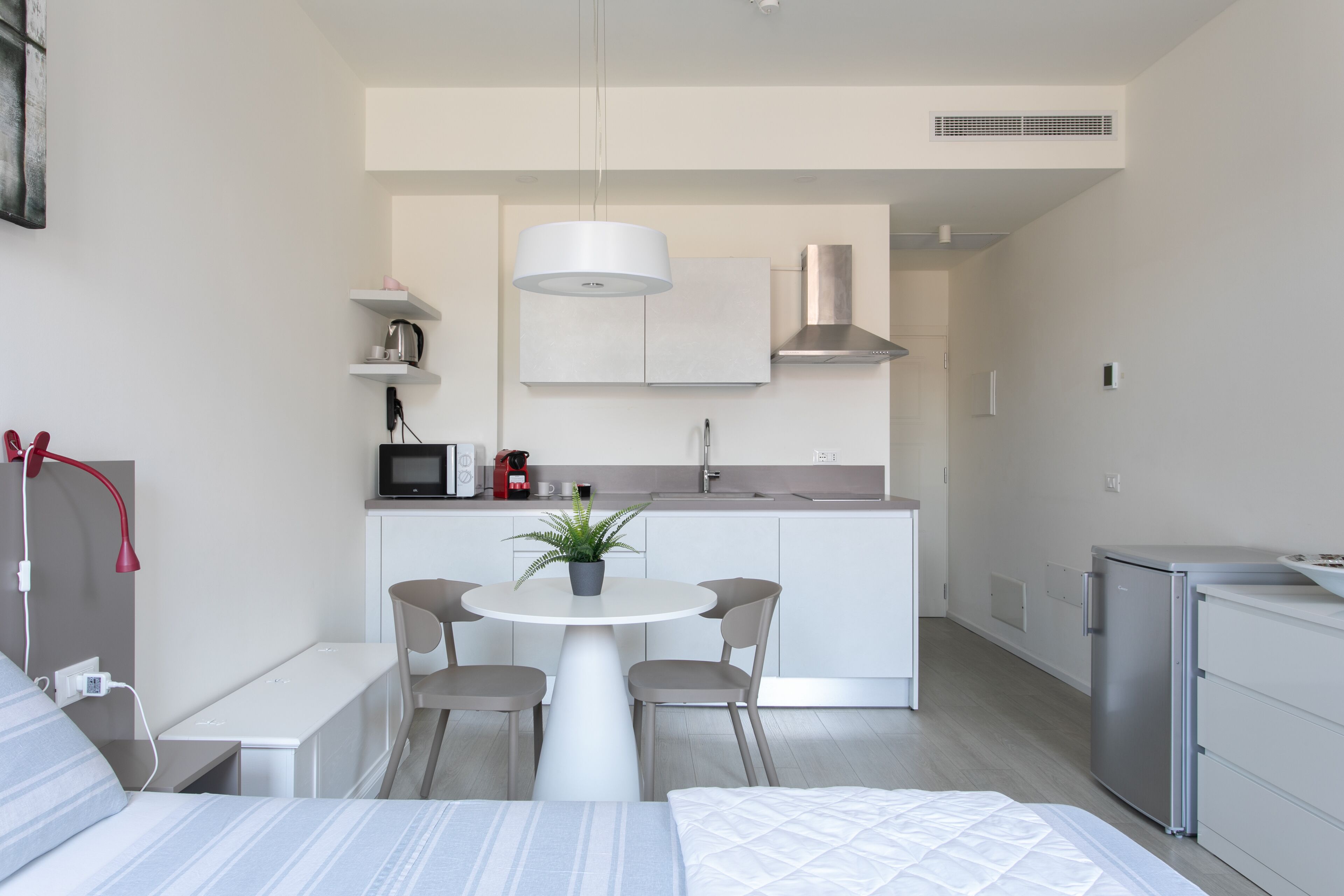 Fridge, microwave, stovetop, coffee/tea maker