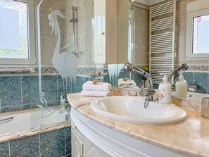 Hair dryer, towels, soap, shampoo