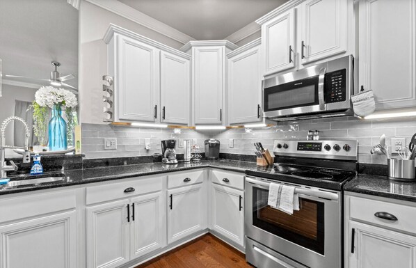 Coffee/tea maker, toaster, blender, cookware/dishes/utensils