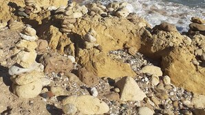 A rocky shoreline with clear blue water and a distant horizon. - Modern & Spacious Flat with Pool close to Oura (Albufeira)