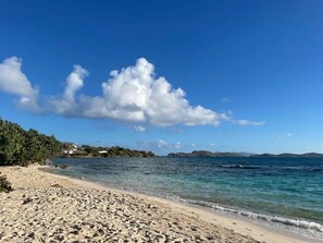 On the beach, sun loungers, beach towels