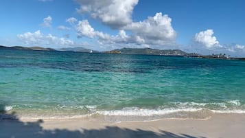 On the beach, sun loungers, beach towels