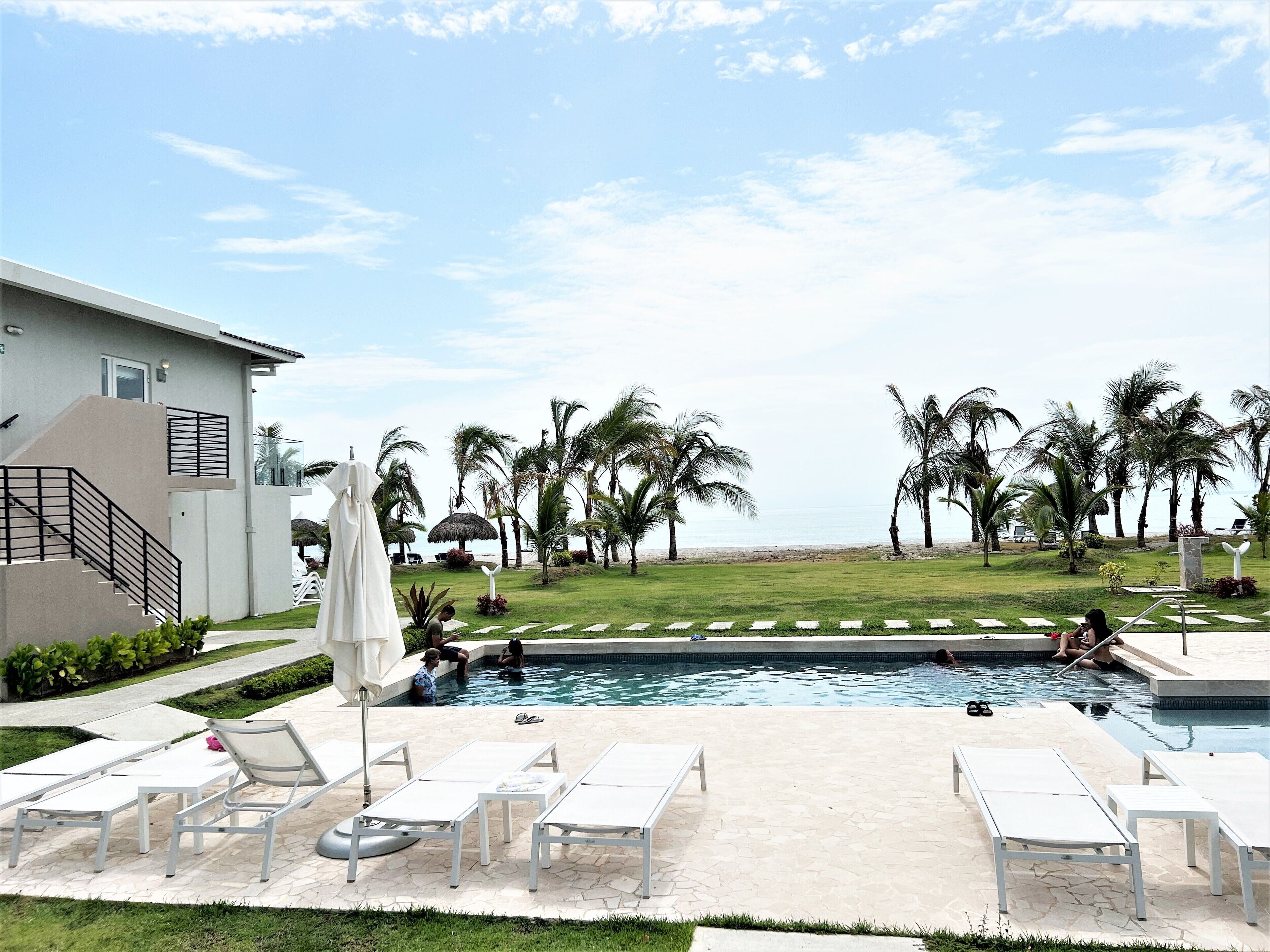 3 outdoor pools, open 7:00 AM to 9:00 PM, pool umbrellas