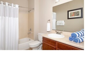 Hair dryer, towels, soap, shampoo