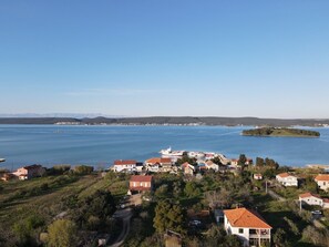 A coastal village with houses and a marina. - Nar Apartment A3 - With sea View Balcony (Pasman)