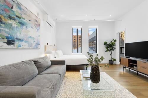 Premium One-Bedroom with Sofa Bed | Living area | 55-inch Smart TV with digital channels, TV, Netflix