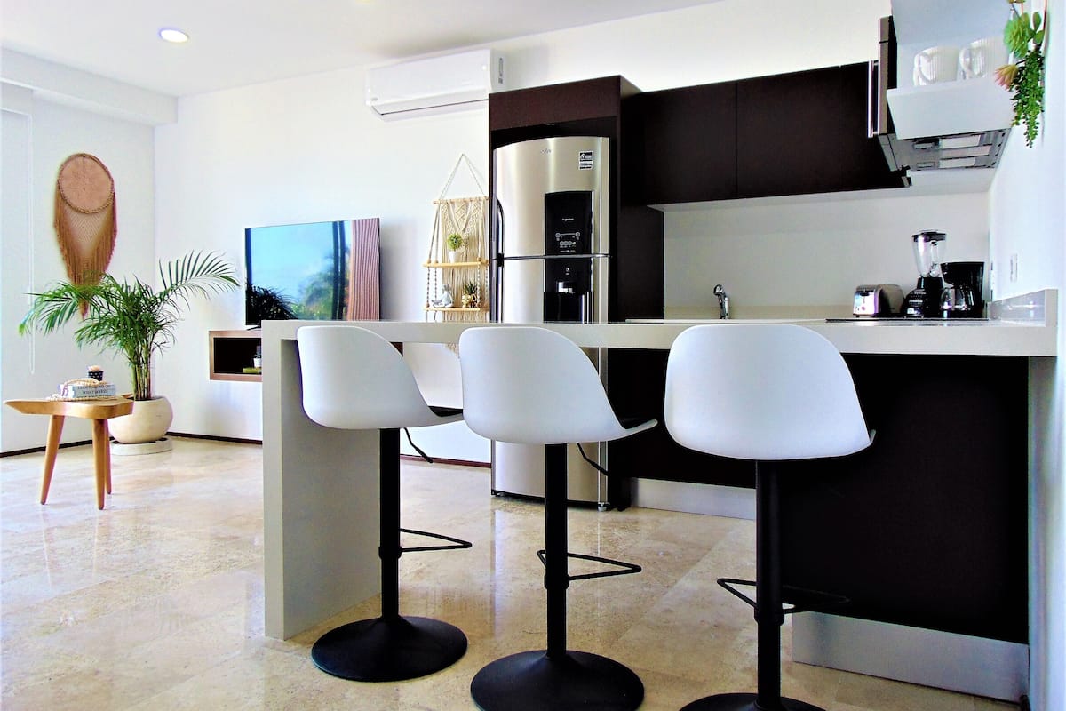 Appartement Confort | 1 chambre, coffres-forts dans les chambres, rideaux occultants