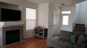 Smart TV, fireplace, books