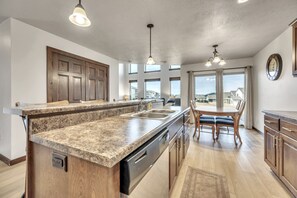 Fridge, microwave, oven, stovetop - Sunset Splash Cabin at Bridges Bay Resort (Arnolds Park)