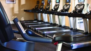 A row of treadmills in a gym with a window in the background. - Coachella 2026! Marriott Shadow Ridge Enclave- First Weekend (Palm Desert)