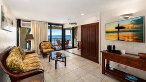 Open living area, large sliding doors to the primary bedroom