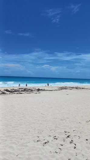 On the beach, sun loungers