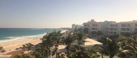On the beach, sun loungers