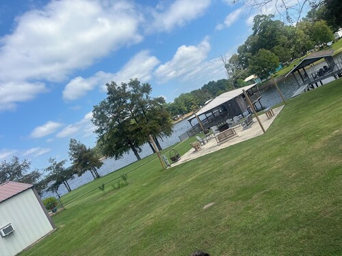 Lake front home in secluded neighborhood mins away f/ boat launch and amenities.