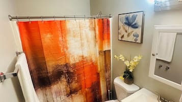 Hair dryer, towels, soap, shampoo