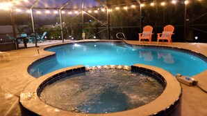 A hot tub and a pool under a covered area with string lights. - 🏝️10 MINS TO BEACH # HEATED POOL/SPA # SLEEP FOR 12@ KIDS FRIENDLY (Melbourne)