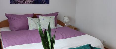 1 bedroom, desk, iron/ironing board, travel crib