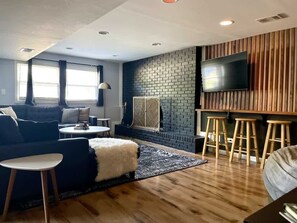 TV, fireplace, books, offices