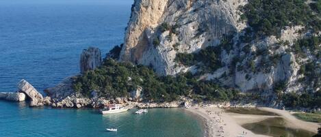 Una spiaggia nelle vicinanze, teli da spiaggia