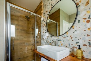Shower, rainfall showerhead, hair dryer, towels