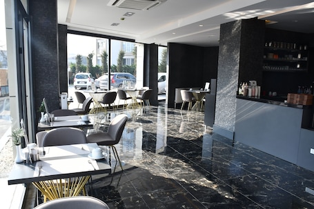 Daily cooked-to-order breakfast for a fee. HMZ Luxury Hotel