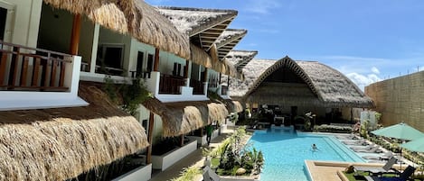 Outdoor pool, open 7:00 AM to 9:00 PM, pool umbrellas, pool loungers