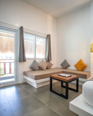 Deluxe Triple Room | Living area | 42-inch flat-screen TV with cable channels, TV - Bathala Resort (Panglao)