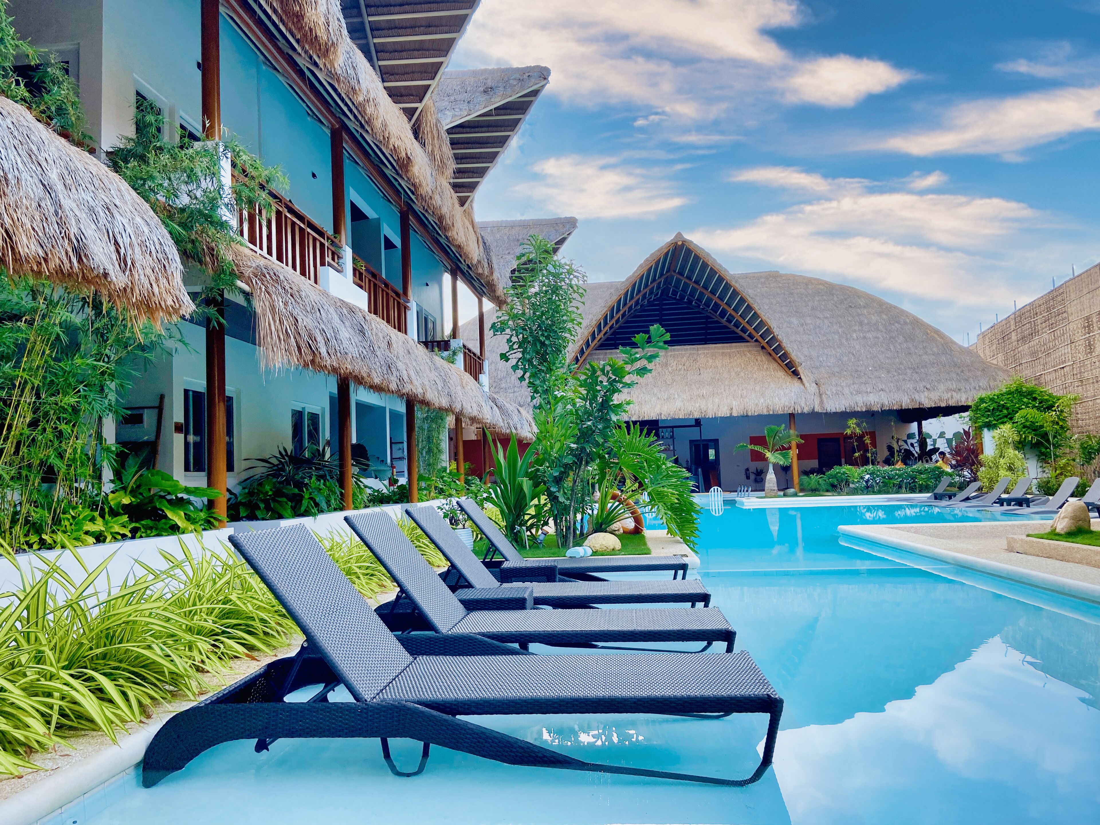 Outdoor pool, open 7:00 AM to 9:00 PM, pool umbrellas, sun loungers