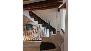 A staircase with a metal railing leading to a lower level. - Beautiful town house in San Jordi, Castellón (Sant Jordi)