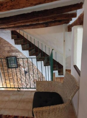 A staircase with a metal railing leading to a lower level. - Beautiful town house in San Jordi, Castellón (Sant Jordi)