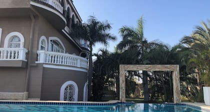 Private resort type condo setting with full access to garden and pool