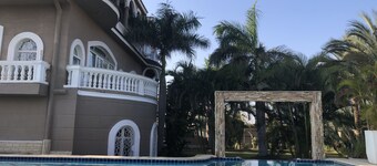 Private resort type condo setting with full access to garden and pool