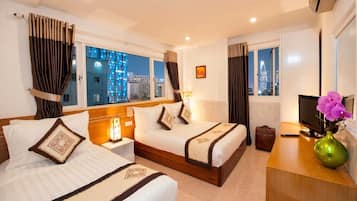 Panoramic Triple Room | Minibar, individually furnished, desk, laptop workspace