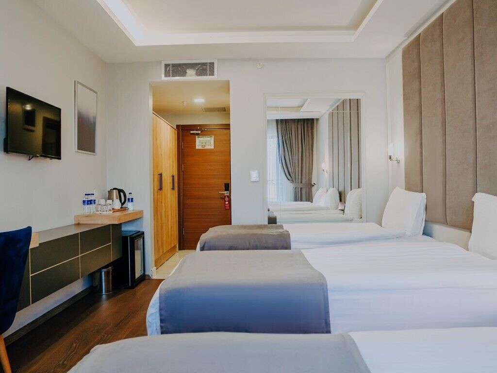 Premium bedding, down duvets, in-room safe, laptop workspace