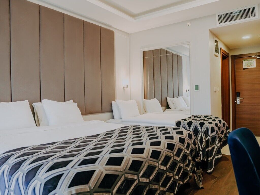 Premium bedding, down duvets, in-room safe, laptop workspace