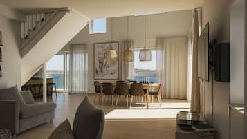 Exclusive Suite | Living area | 26-inch Smart TV with digital channels, TV