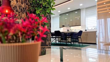 Standard Apartment | Living area | 43-inch Smart TV with satellite channels, TV