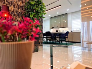 Standard Apartment | Living area | 43-inch Smart TV with satellite channels, TV
