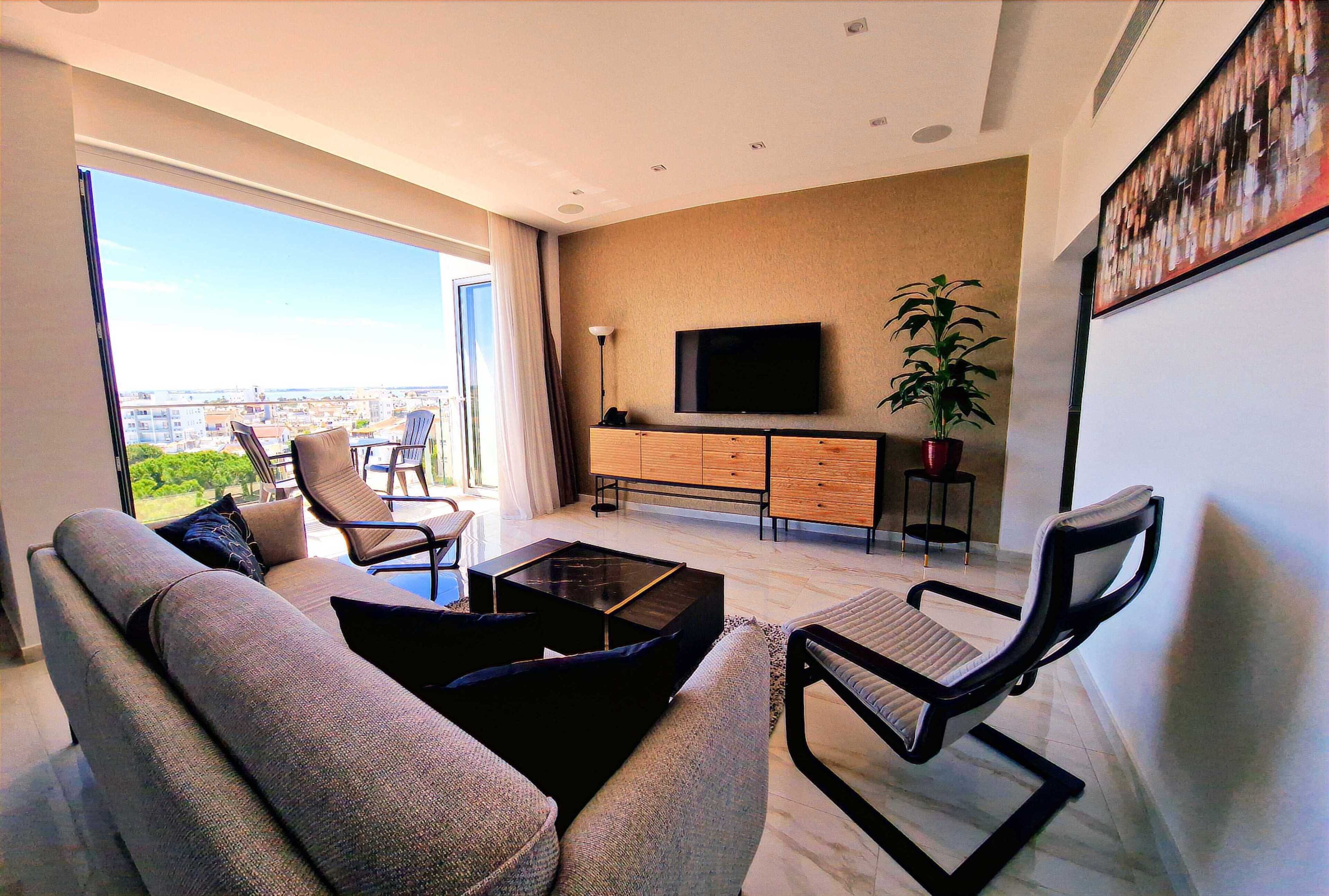 Superior Apartment | Living area | 43-inch Smart TV with satellite channels, TV