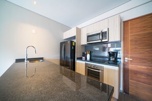 Fridge, microwave, coffee/tea maker, toaster