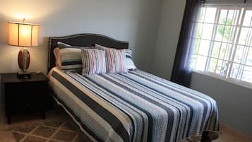 Memory-foam beds, laptop workspace, blackout curtains