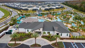 A resort with multiple buildings, a swimming pool, and a parking area. - 🍂 Fall Special! Bliss Pool Villa Close to Disney & Universal; Great Clubhouse🏝️ (Kissimmee)